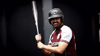 Elmo visits the Rawlings Baseball Experience in St. Louis