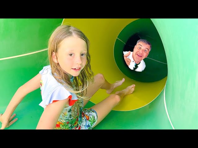 Nastya and dad have fun in the playgrounds