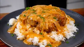 Cajun Smothered Pork Chops in Onion Gravy | Easy Southern Dinner Recipe (2026) poster