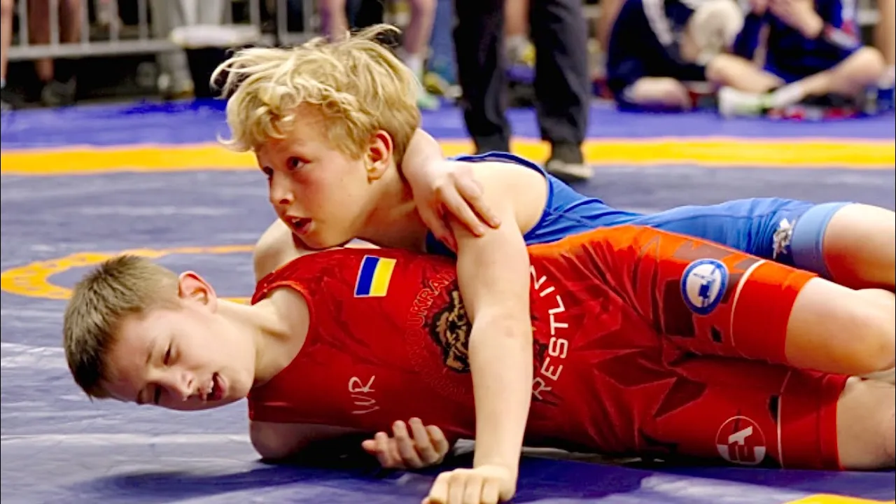 U13 Andrii Polishchuk (UKR) vs Dominyk Saveljev (LTU) 38kg. Greco-roman boys wrestling. B-cam-man