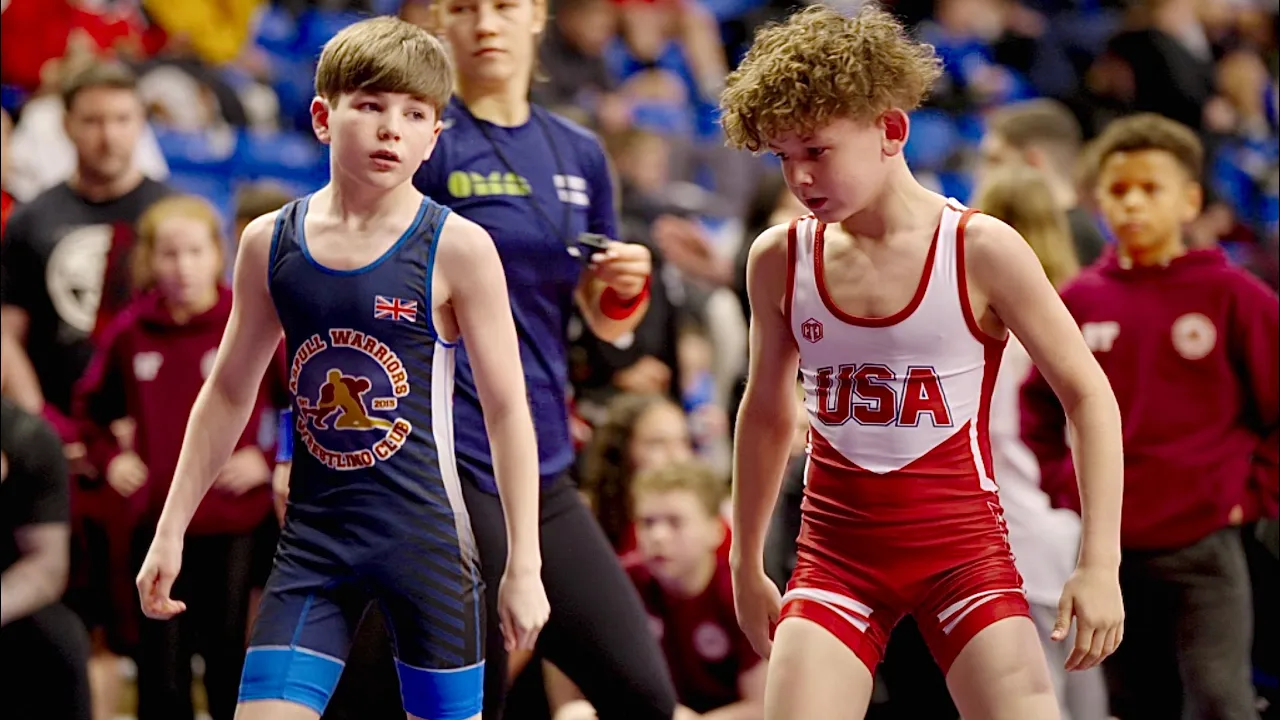U13 Mason Betterman (USA) vs Harry Fitzgibbon (GBR) 32kg. Freestyle boys youth wrestling. B-cam-man