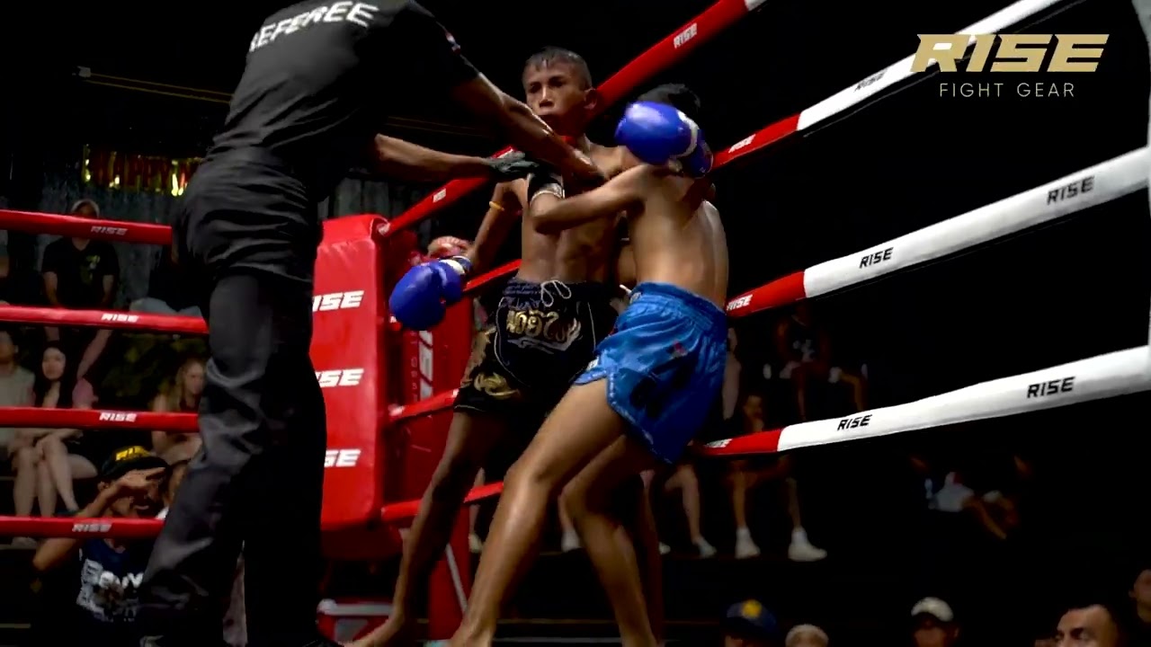 Muay Thai kids fight in Rawai Stadium, Phuket Thailand. Future warriors in action!