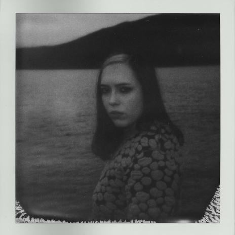 M (stripped) cover art