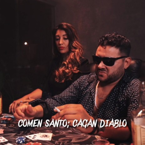 Comen santo; cagan diablo cover art
