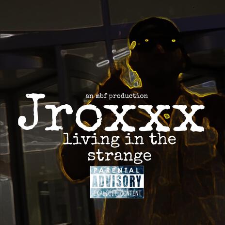 LIVING IN THE STRANGE cover art