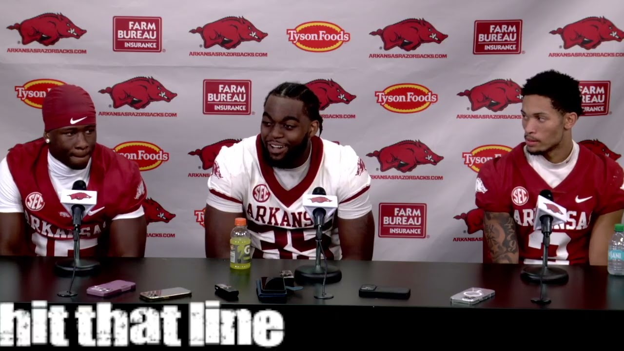 Razorbacks' defensive players on Red's 14-13 win over White on Saturday cover art