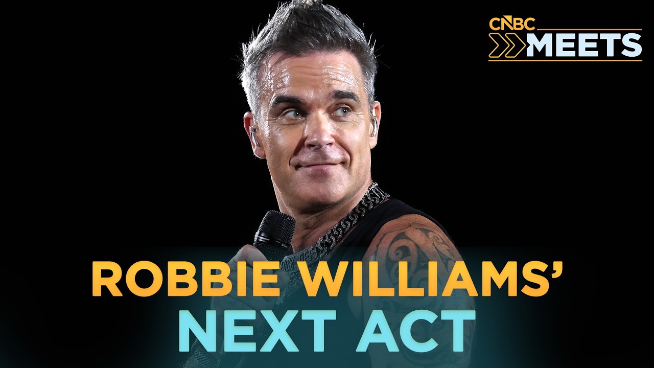 After 30 Years, Robbie Williams Wants Something Bigger cover art