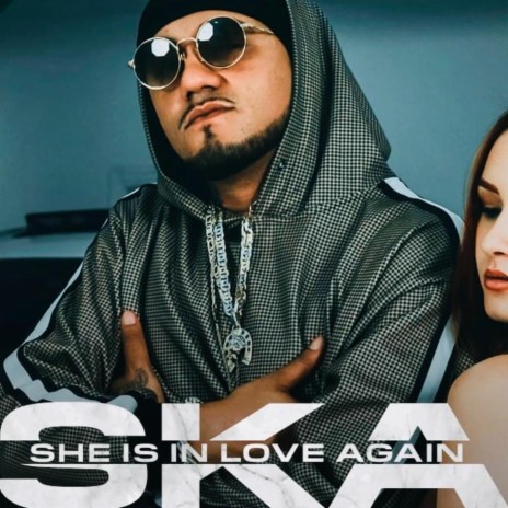She Is in Love Again cover art