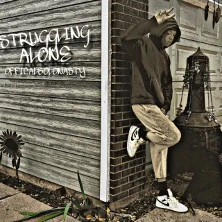 STRUGGLING ALONE cover art