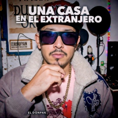 UNA CASA EN EL EXTRANJERO cover art