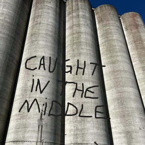 Caught In The Middle cover art