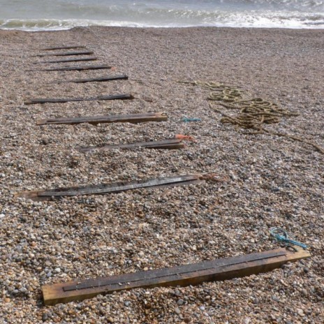 On A Desolate Shore A Shadow Passes By cover art