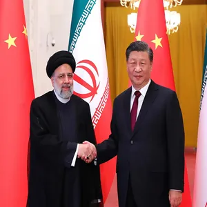 Here’s Why China Is A Quiet Force in the Israel-Iran Conflict cover art