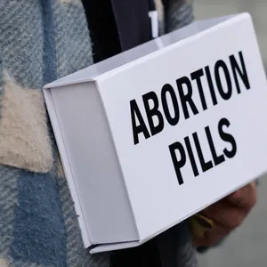 Abortion pills at the Supreme Court cover art