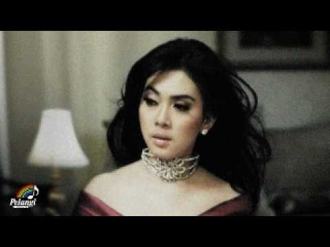 Syahrini - Sesuatu (Official Lyric Video) cover art