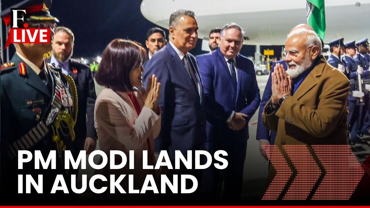 PM Modi LIVE: New Zealand Luxon Greets PM Modi as He Lands in Auckland, New Zealand cover art