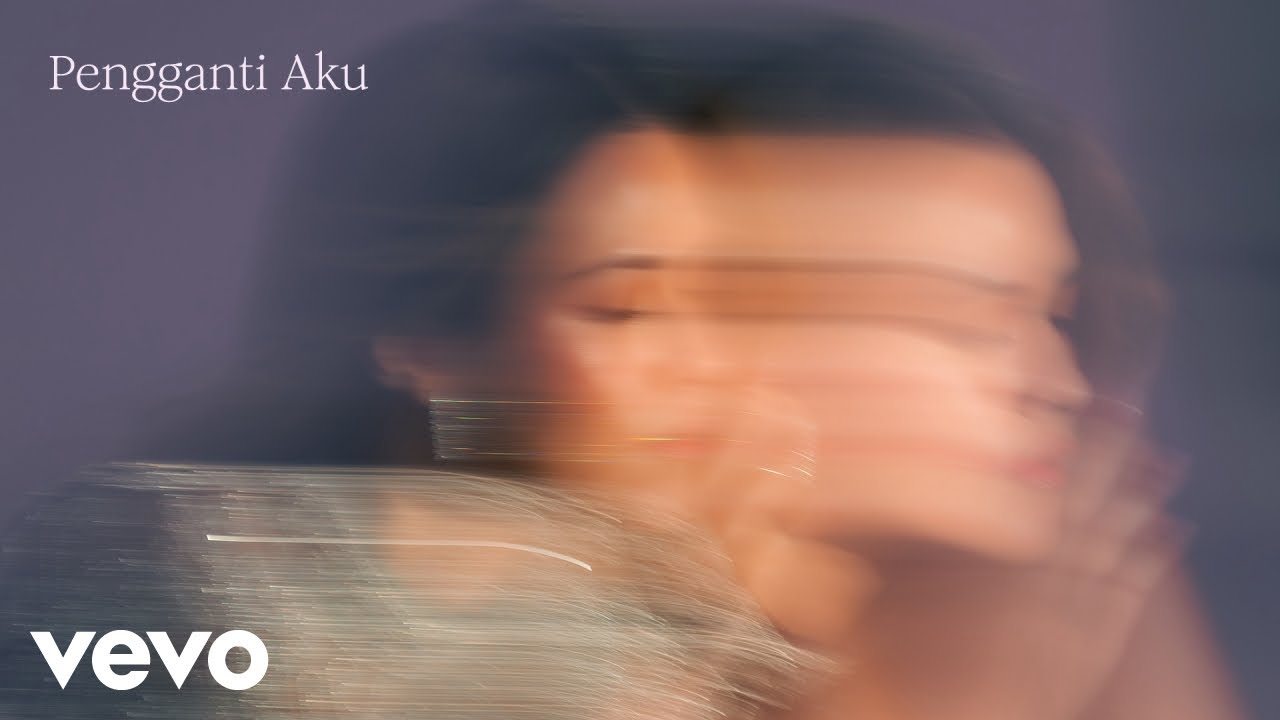 Raisa - Pengganti Aku (Official Lyric Video) cover art