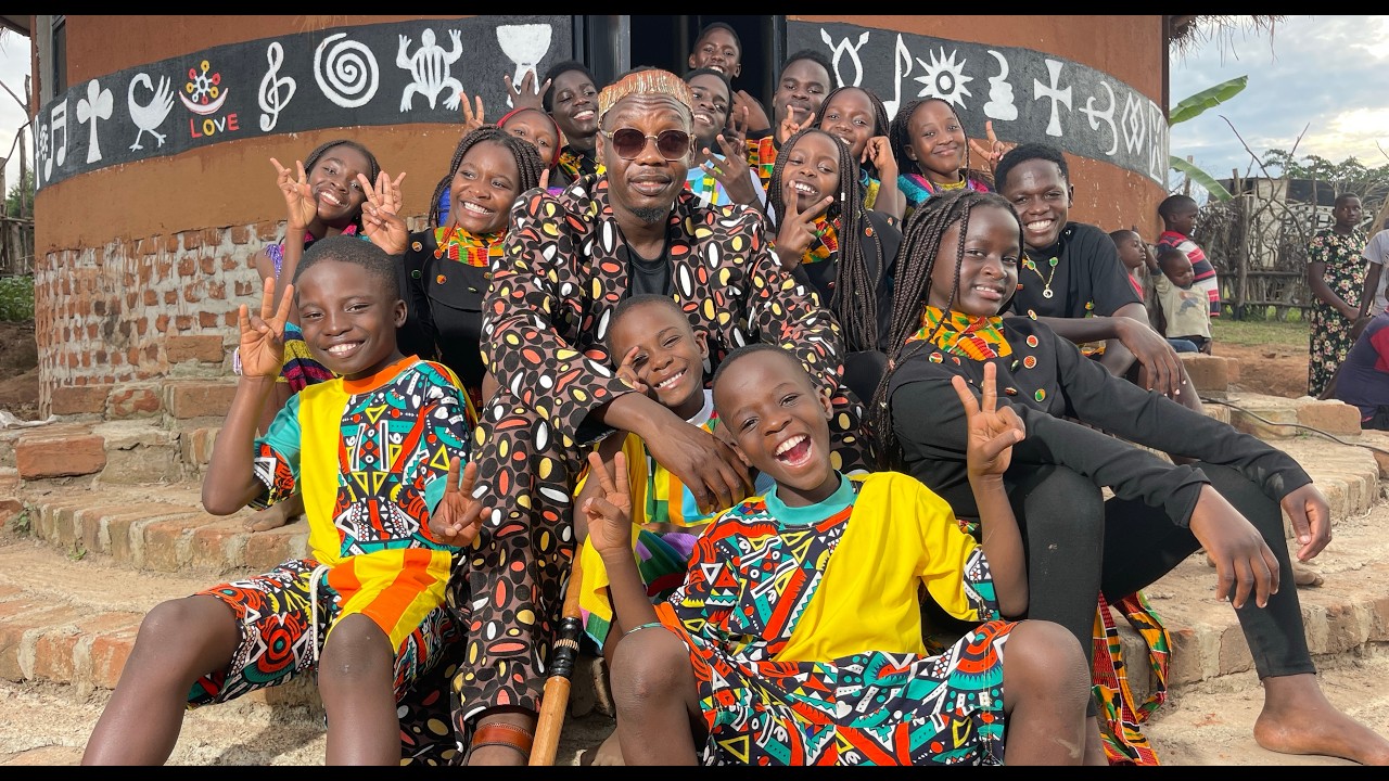 Mesach Semakula - Africa (waka waka) ft Triplets Ghetto Kids (Official Video) cover art