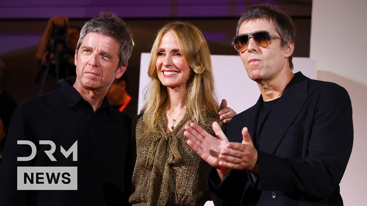 WATCH: Oasis Reunion Stuns Venice as Liam and Noel Gallagher Hit the Red Carpet | AA15 cover art