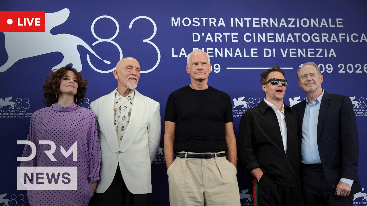 LIVE: Venice Premiere Red Carpet for Martin McDonagh’s 'Wild Horse Nine' | DRM News | AA1G cover art