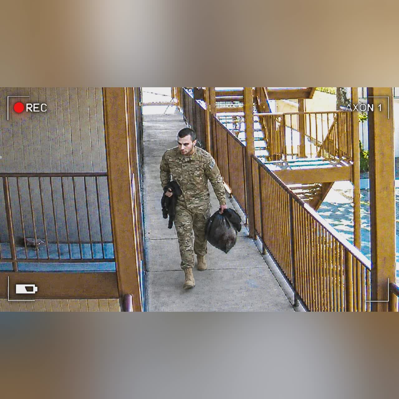 Killer Soldier Doesn’t Realize He Is Being Recorded on CCTV cover art