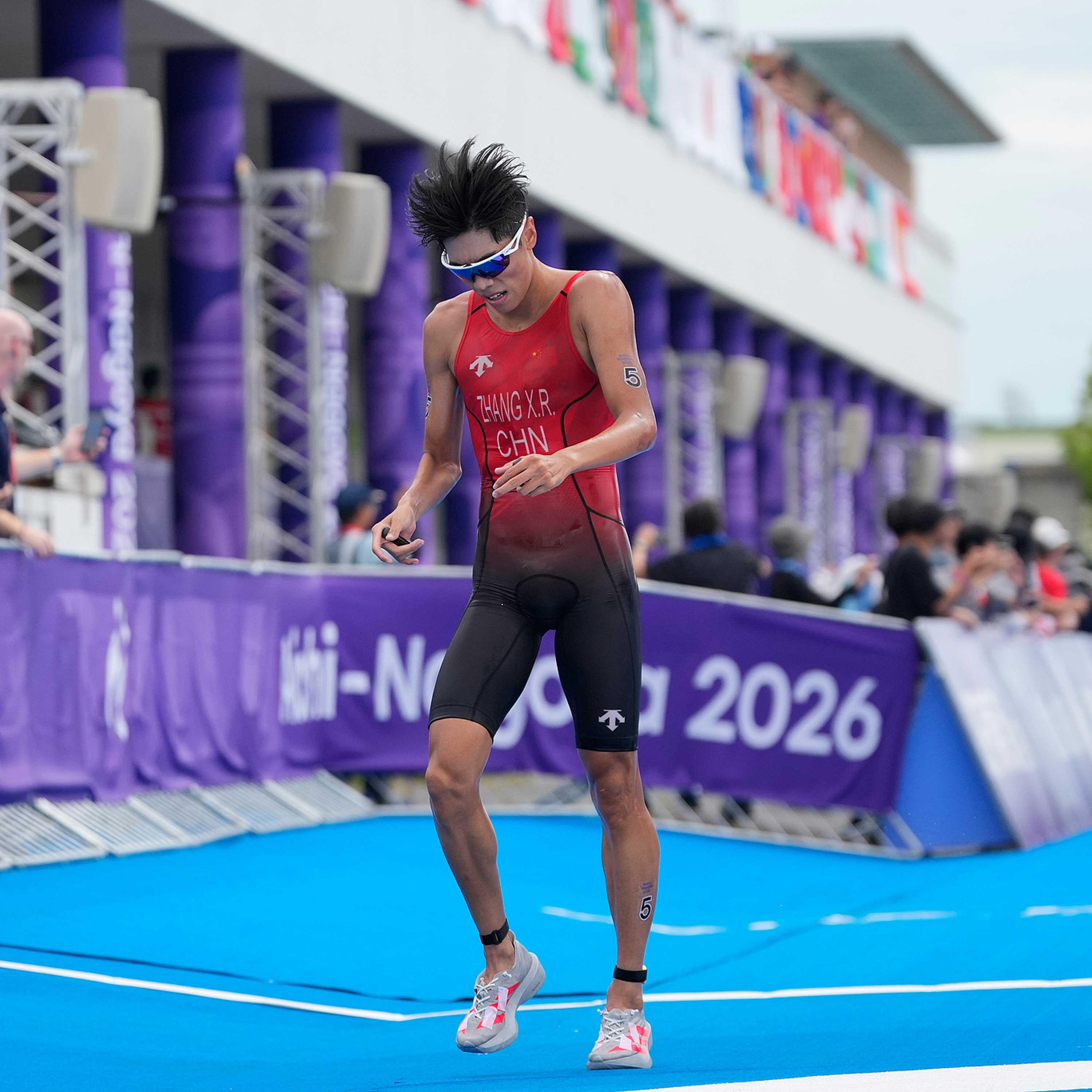 Zhang Xirui wins silver in men's triathlon to give China first medal at Asian Games cover art